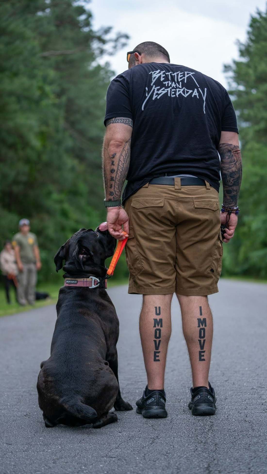 George Spohrer working a dog outdoors in Jacksonville, NC